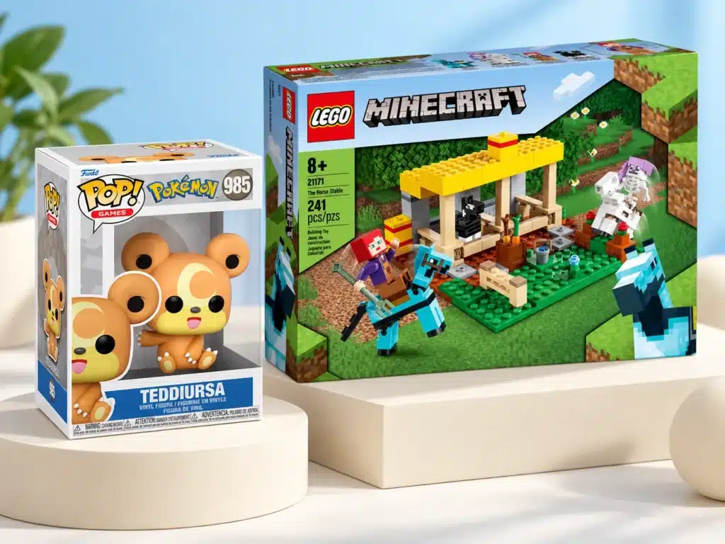 Funko POP Teddiursa and a LEGO Minecraft set on white plinths