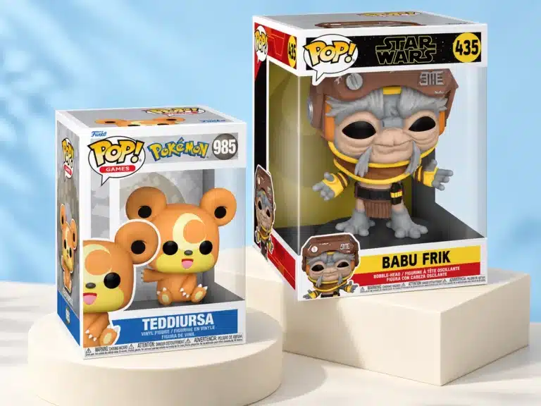 Funko POP Teddiursa and Babu Frik figures on display blocks